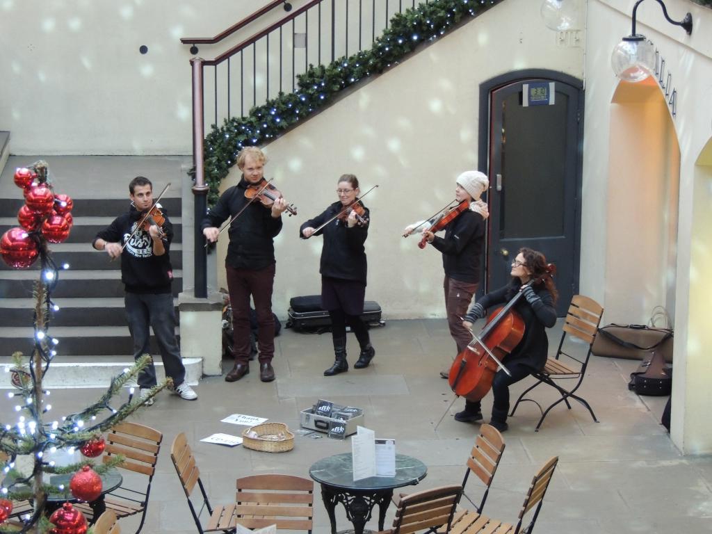 Musicians playing at Coventry Garden markets