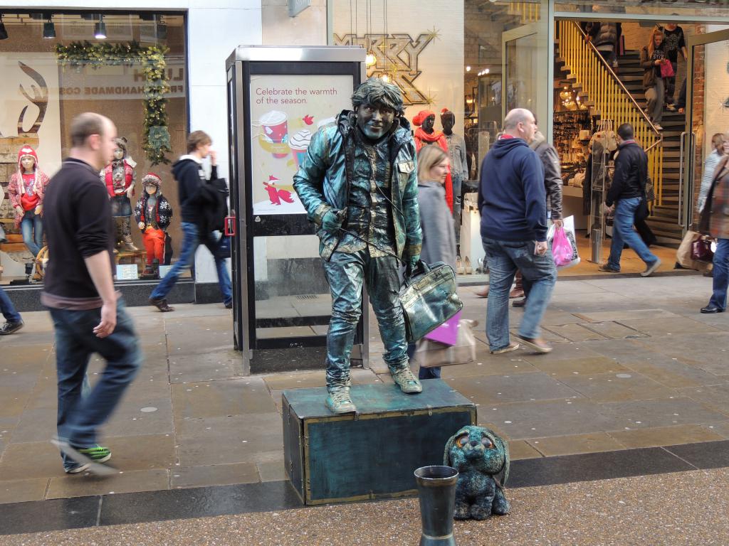 Street entertainer - wonder how long he can stay this way