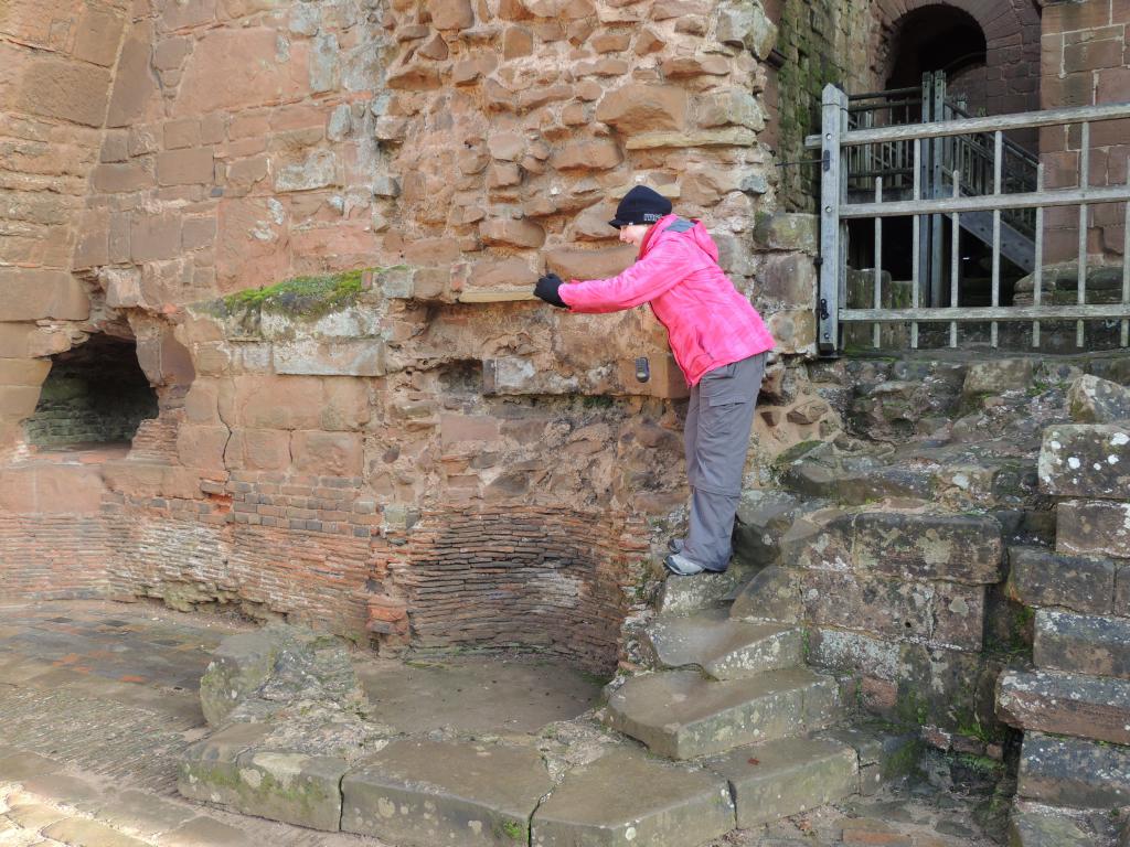 Kayla stirring the imaginary massive cauldron