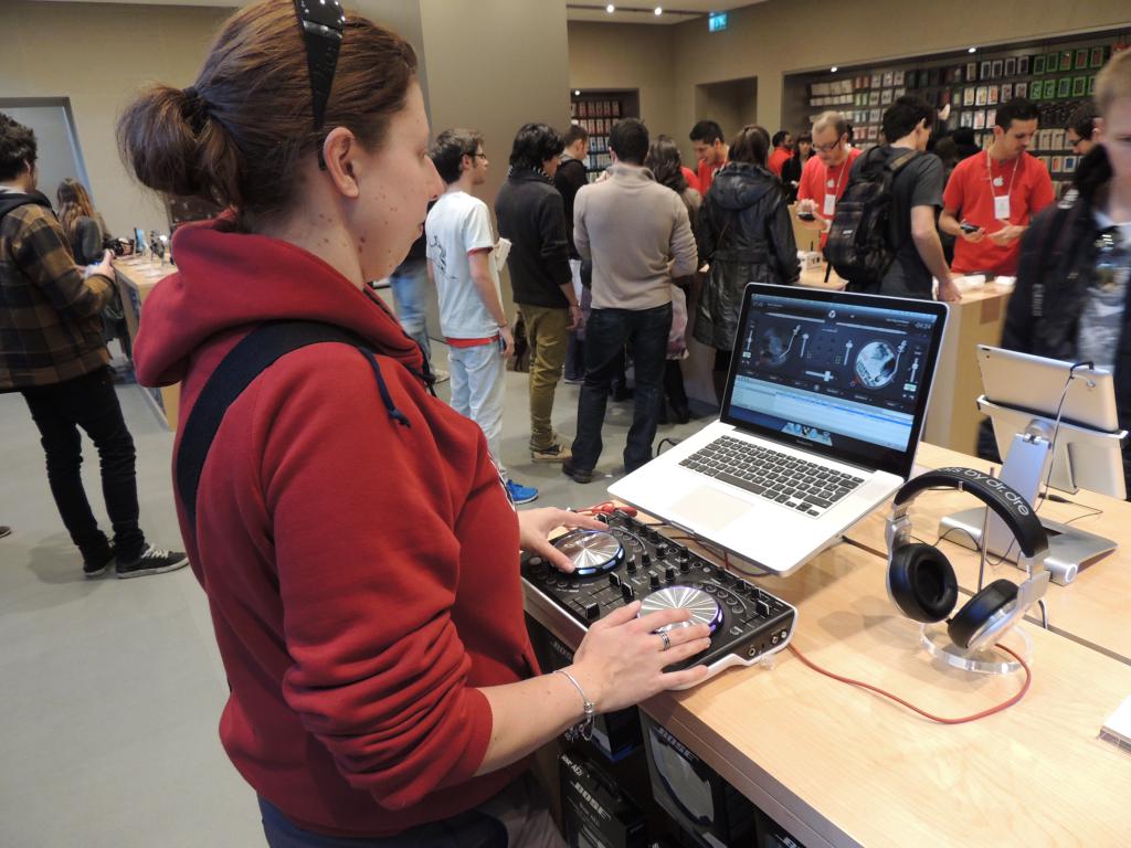 Kayla DJing on the decks at the Mac store