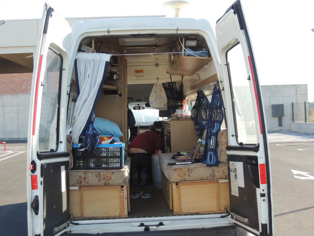 Parked in the local supermarket carpark spring cleaning the van... in winter