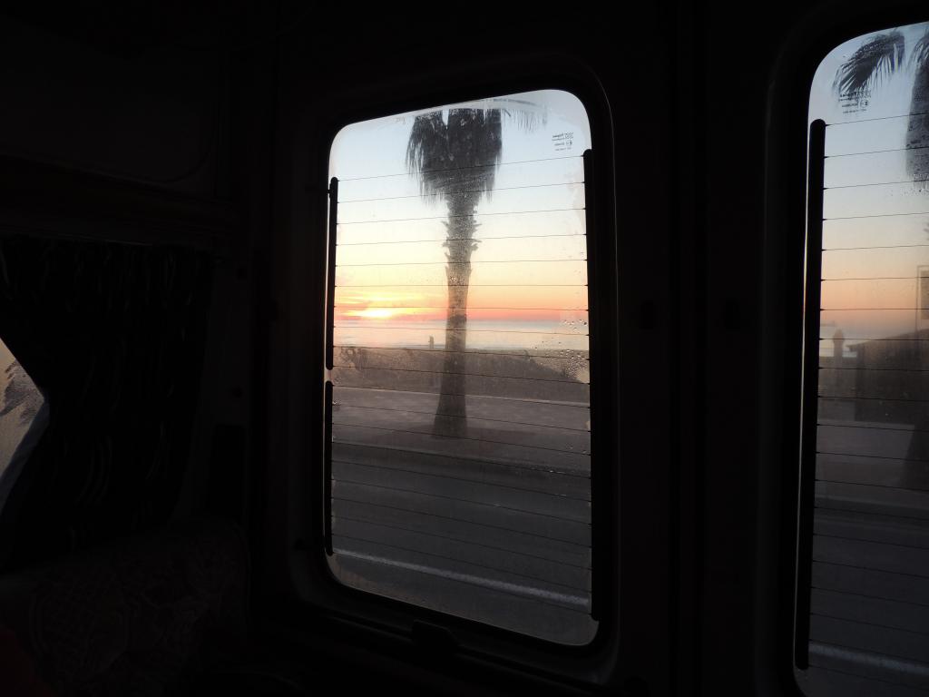 Our view of the sunrise over the beach from the van