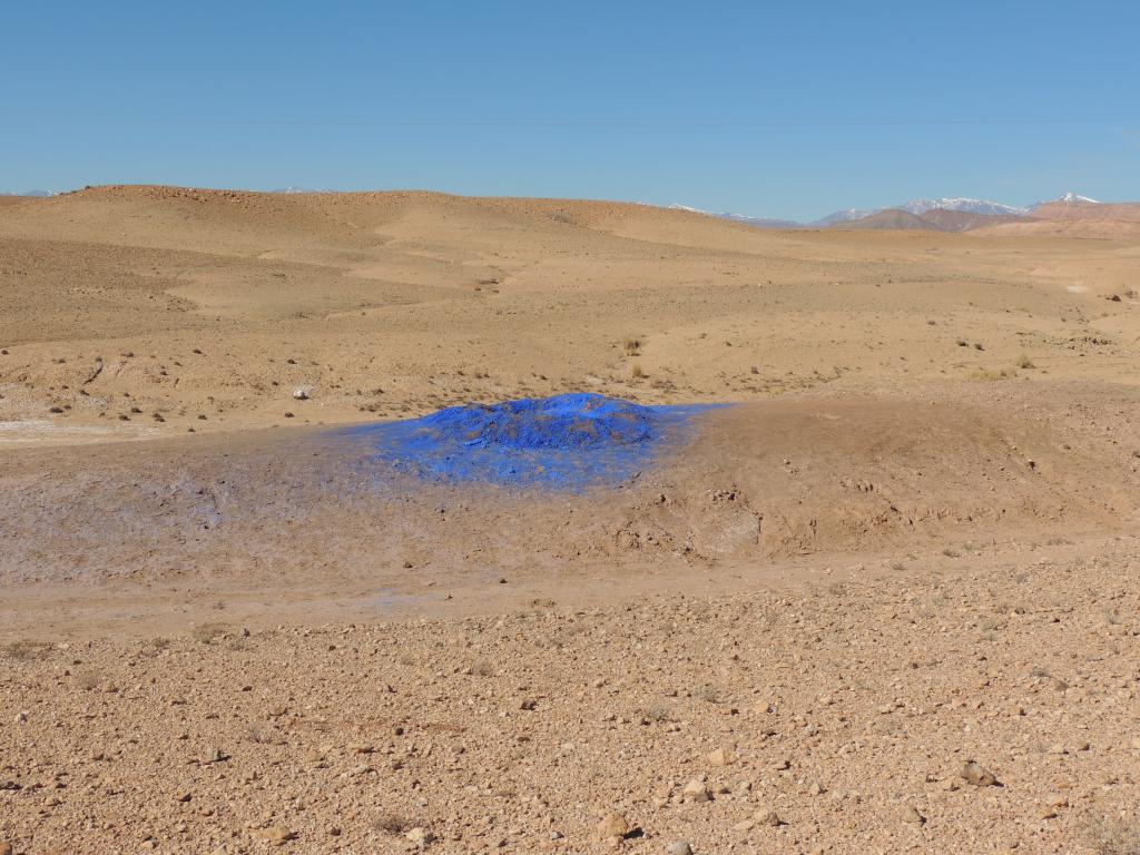 Someone painted the ground blue so Mohammed decided to stop, crank the music and start a dance party!