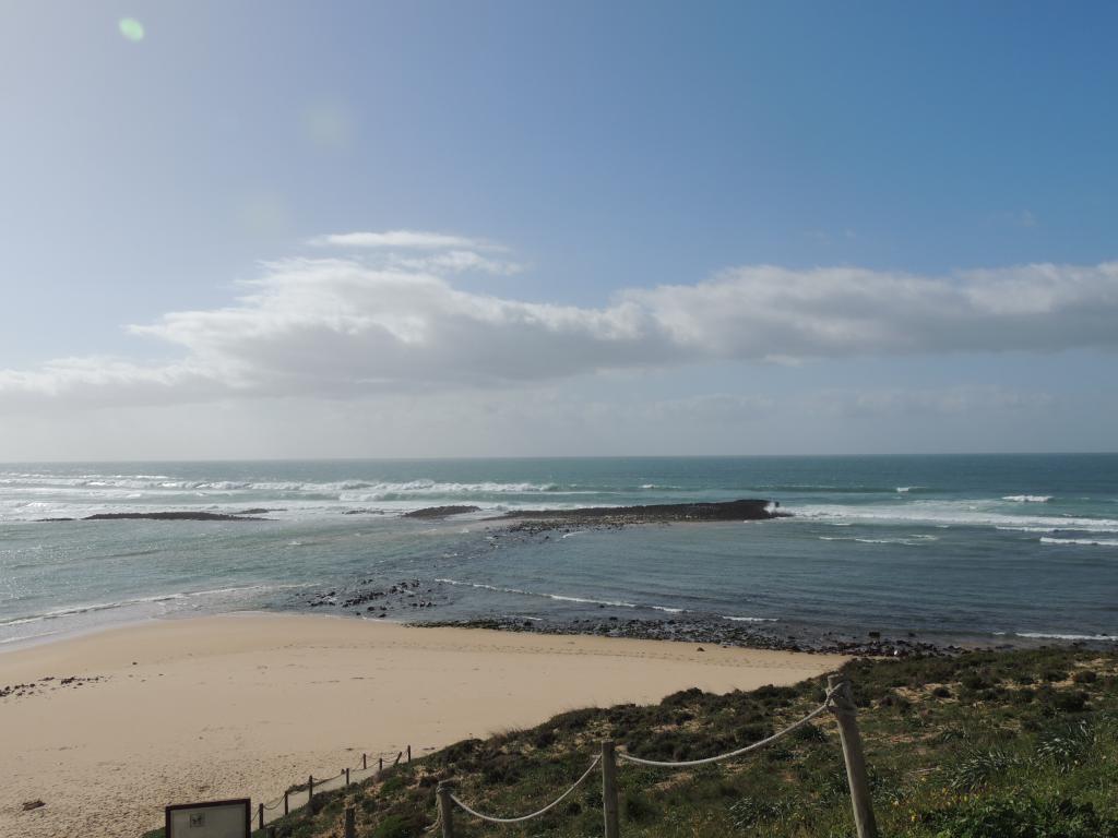 View from the van of the Milfontes river mouth joining the Atlantic ocean