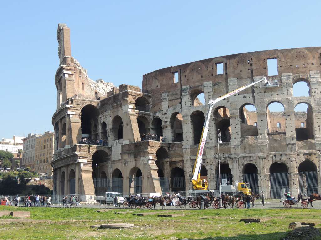 The crane (and people) give an indication about the size of the arena