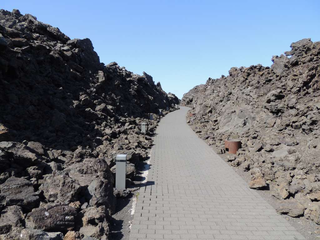 The path to the Blue lagoon cut through the lava fields