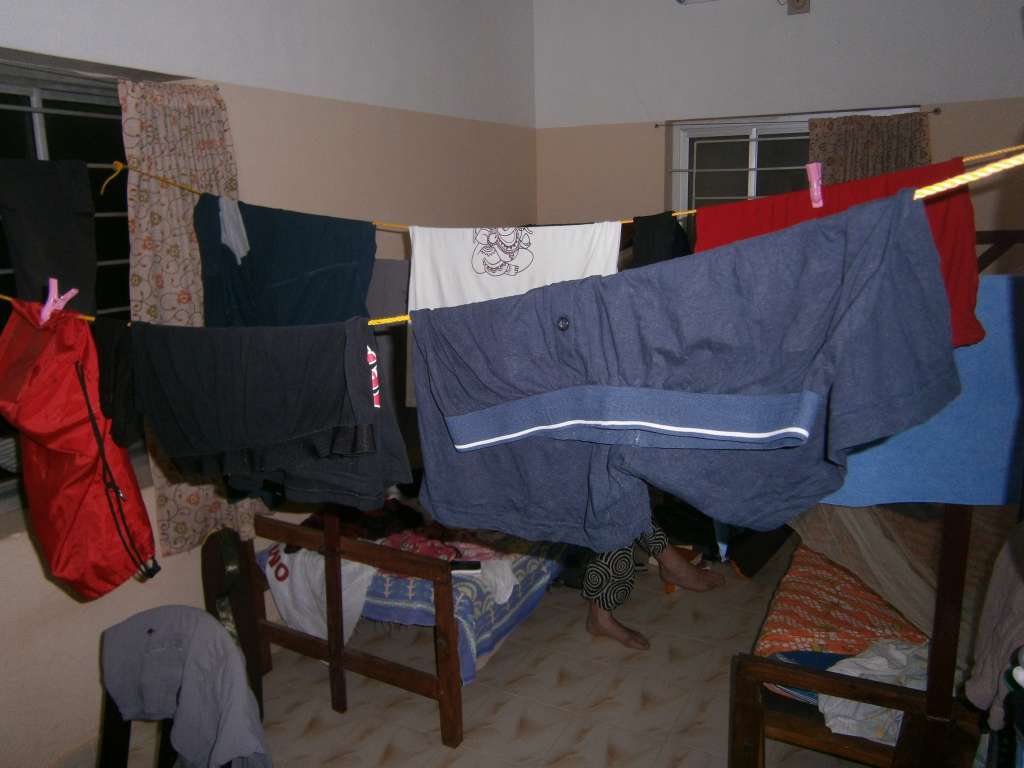 Our twin room at the ashram. Very small and basic plus it doubles as a laundry