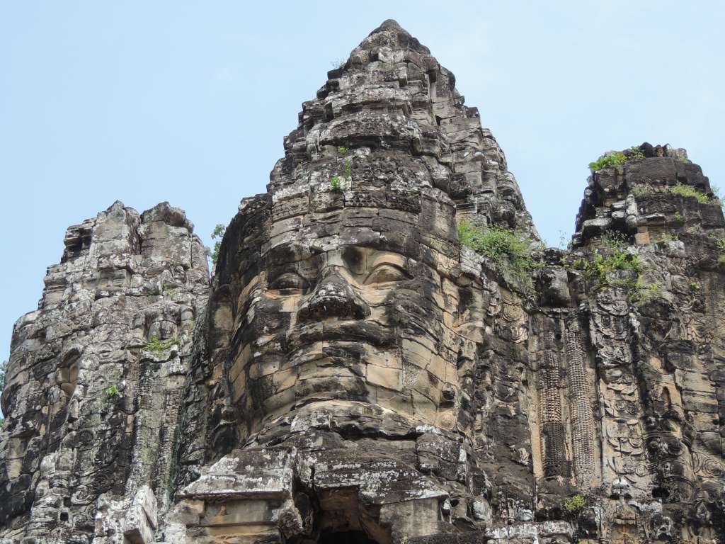 Sculpted head above the gate