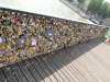 Love Locks on the bridge... Most don't know that the panels are removed every 6 months.