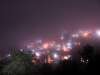 Misty night time view of McLeod Ganj from Tibet World